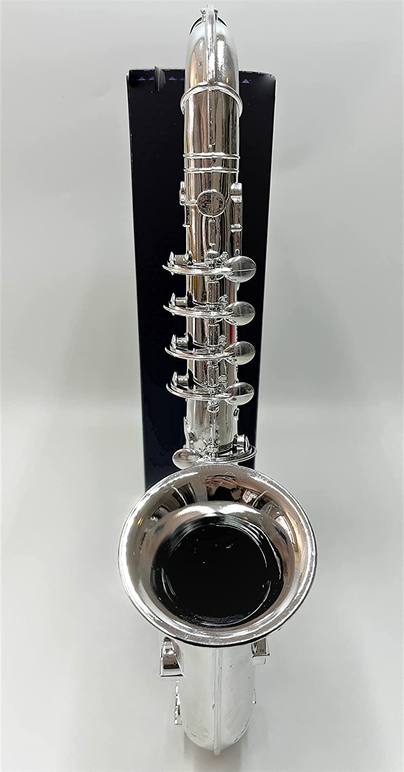 TOY Instruments Set Trumpet, Saxophone and Clarient with standard keys in perfect pitch are easy and intuitive to create real music. Instruments measures 16 inches in length.